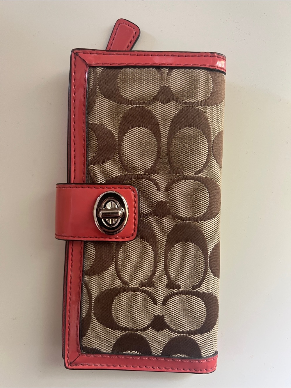 Coach Signature Canvas Phone Wallet with Coral Pink Trim